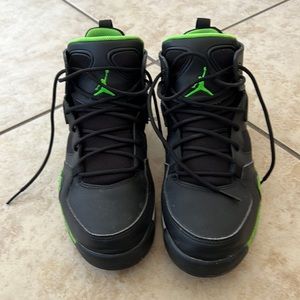 Black and green Air Jordan’s size 9
